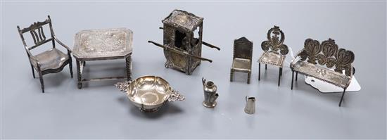 Eight assorted white metal miniature items including table and chairs and a plated sedan chair.